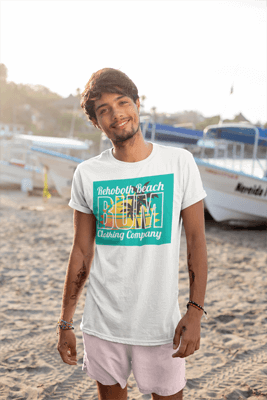 young man at beach wearing Rehoboth Beach Bum T-shirt